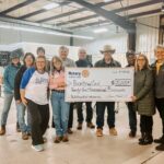 Fox Carolina news segment featuring Bounty & Soul's $25,000 donation from Rotary District 7680 to support communities impacted by Hurricane Helene. The check presentation is shown with a news anchor and representatives from Rotary and Bounty & Soul.