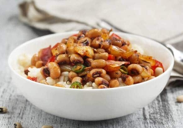Homemade Hoppin john  - Southern style New year good luck food served in a white bowl